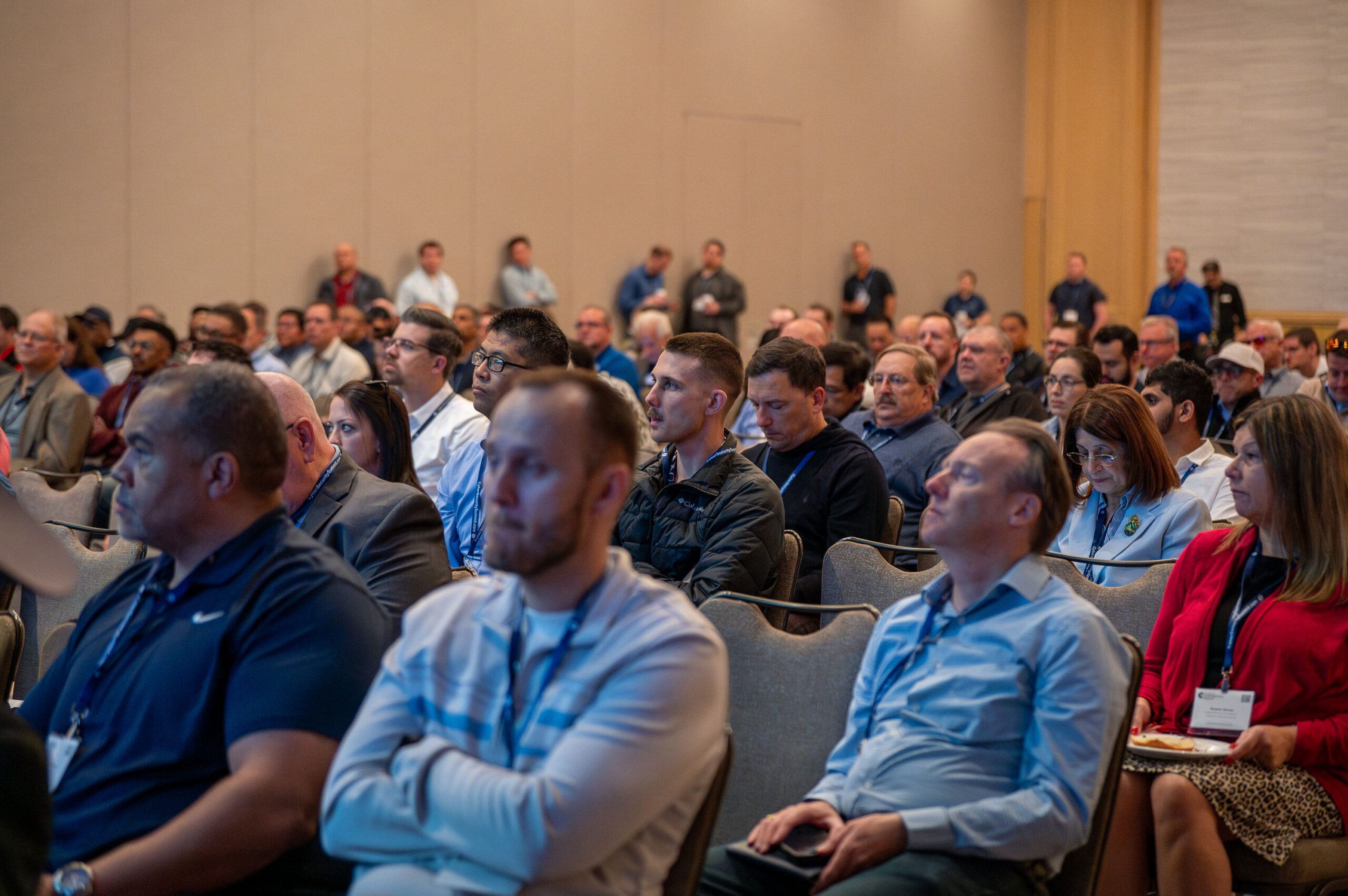 Delegates seated at a Cybersecurity Summit keynote